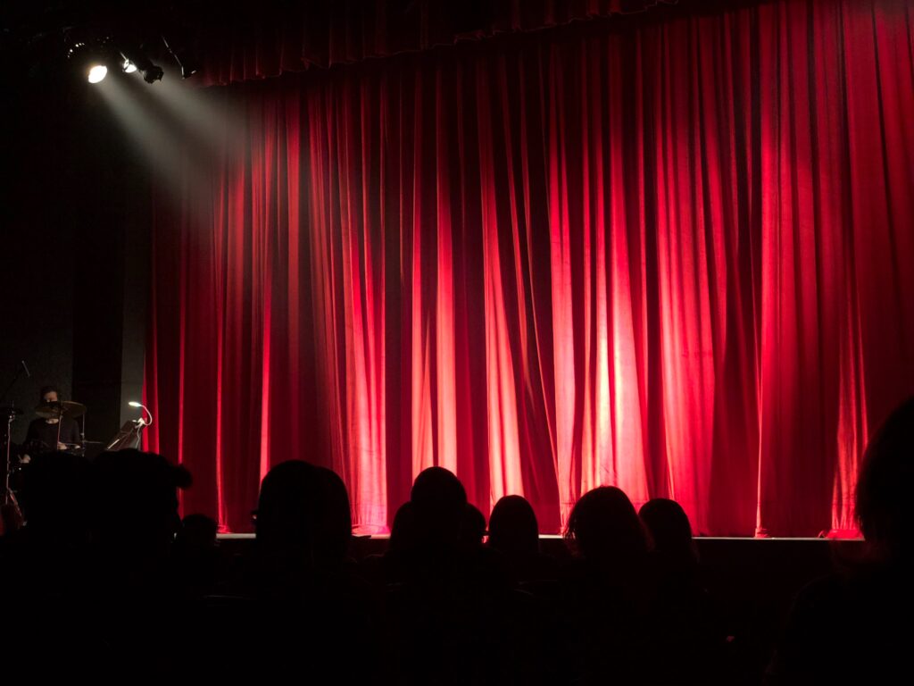 Spotlight on a stage with curtain